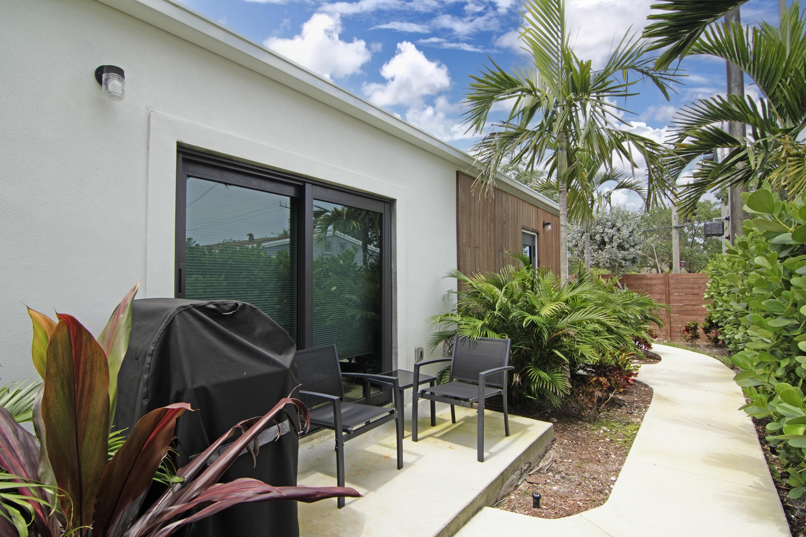 Relish in the tranquility of our secluded backyard retreat