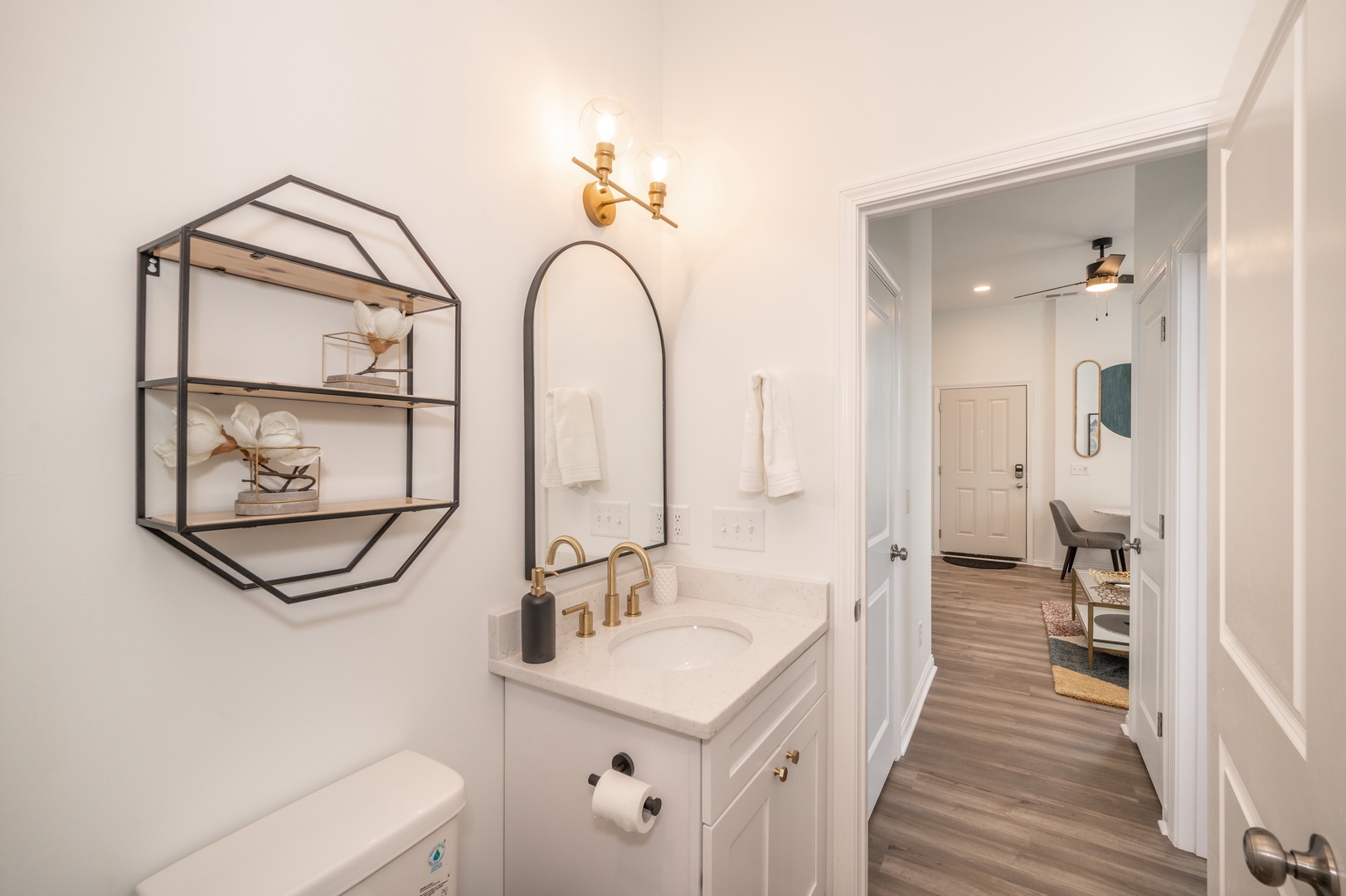 Unit 201: The bathroom offers a chic single vanity and spa-like glass shower