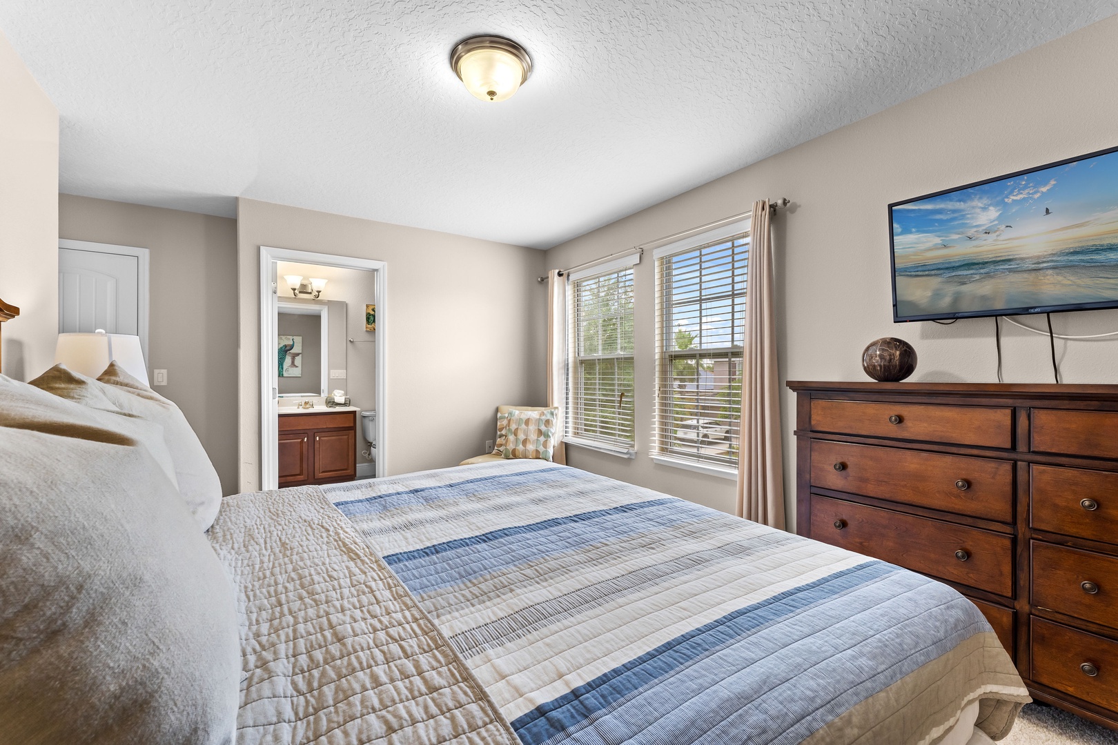 Bedroom 6 with king bed, Smart TV, and ensuite