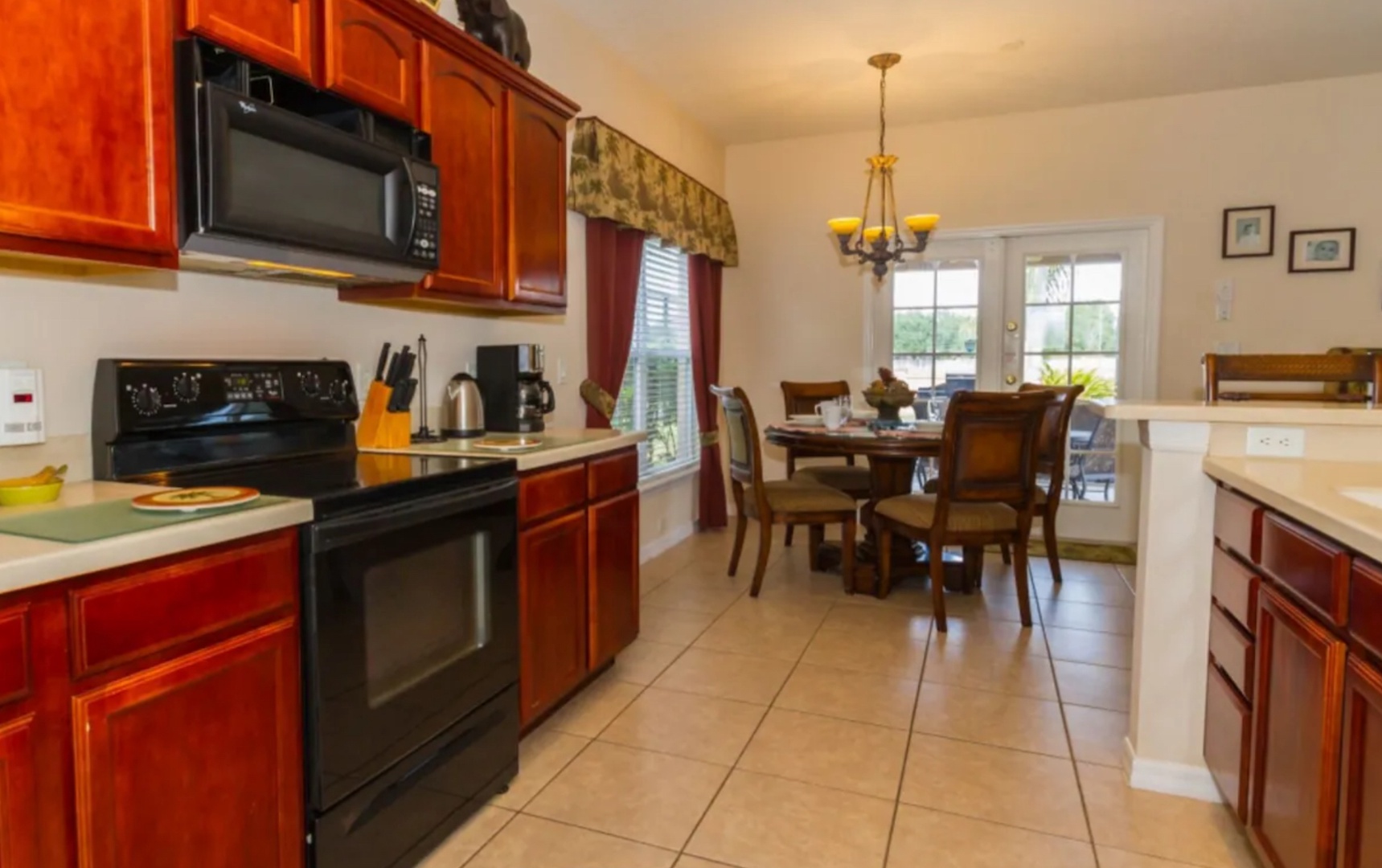 The kitchen offers ample storage space & all the comforts of home