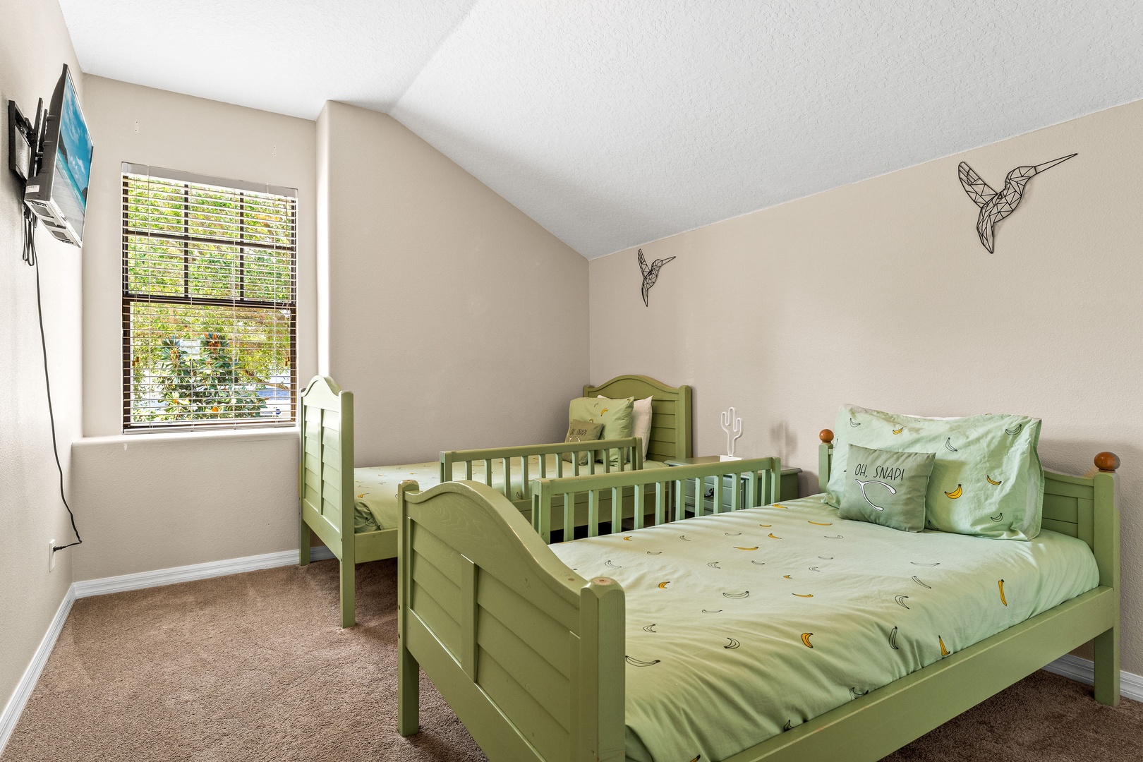 Cozy double twin bedroom on 2nd floor with charming hummingbird accents