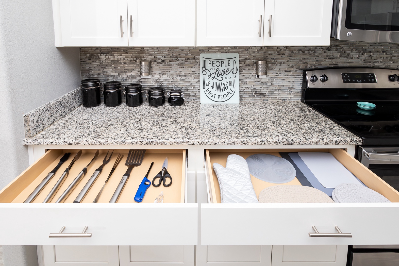 The open, airy kitchen offers ample space & all the comforts of home