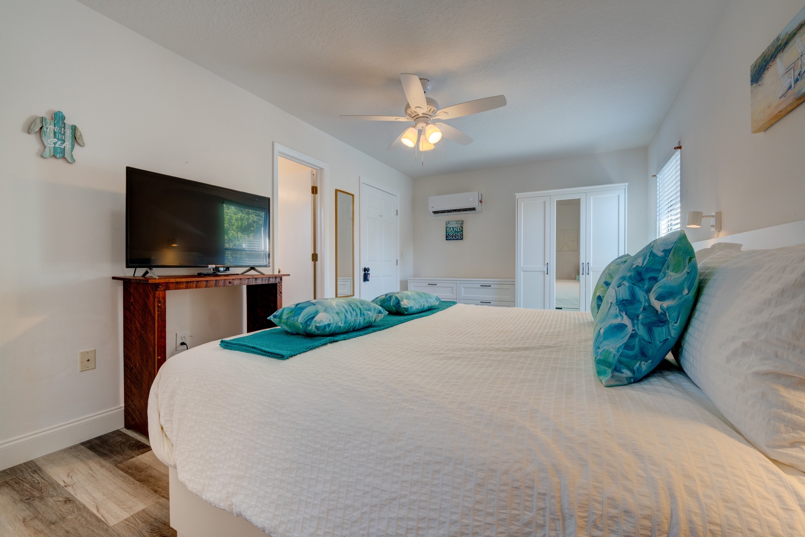 Recharge in this king suite, offering a private ensuite ceiling fan & smart TV