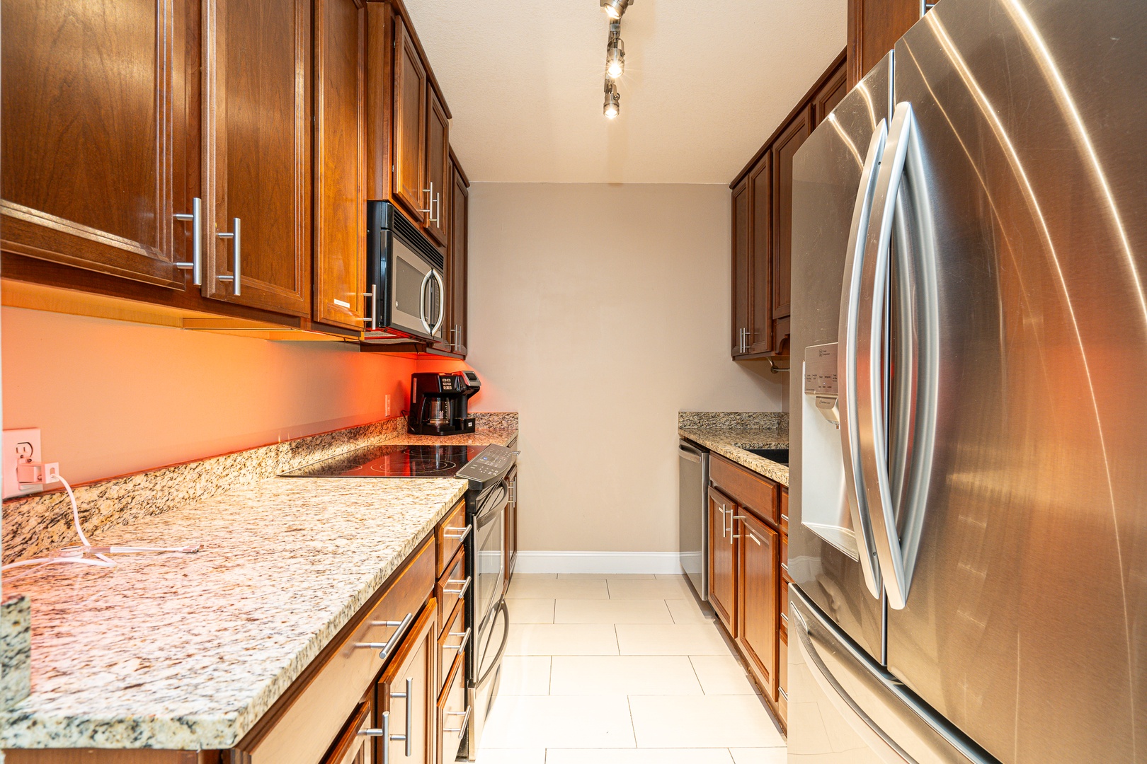 The inviting kitchen offers ample space & all the comforts of home