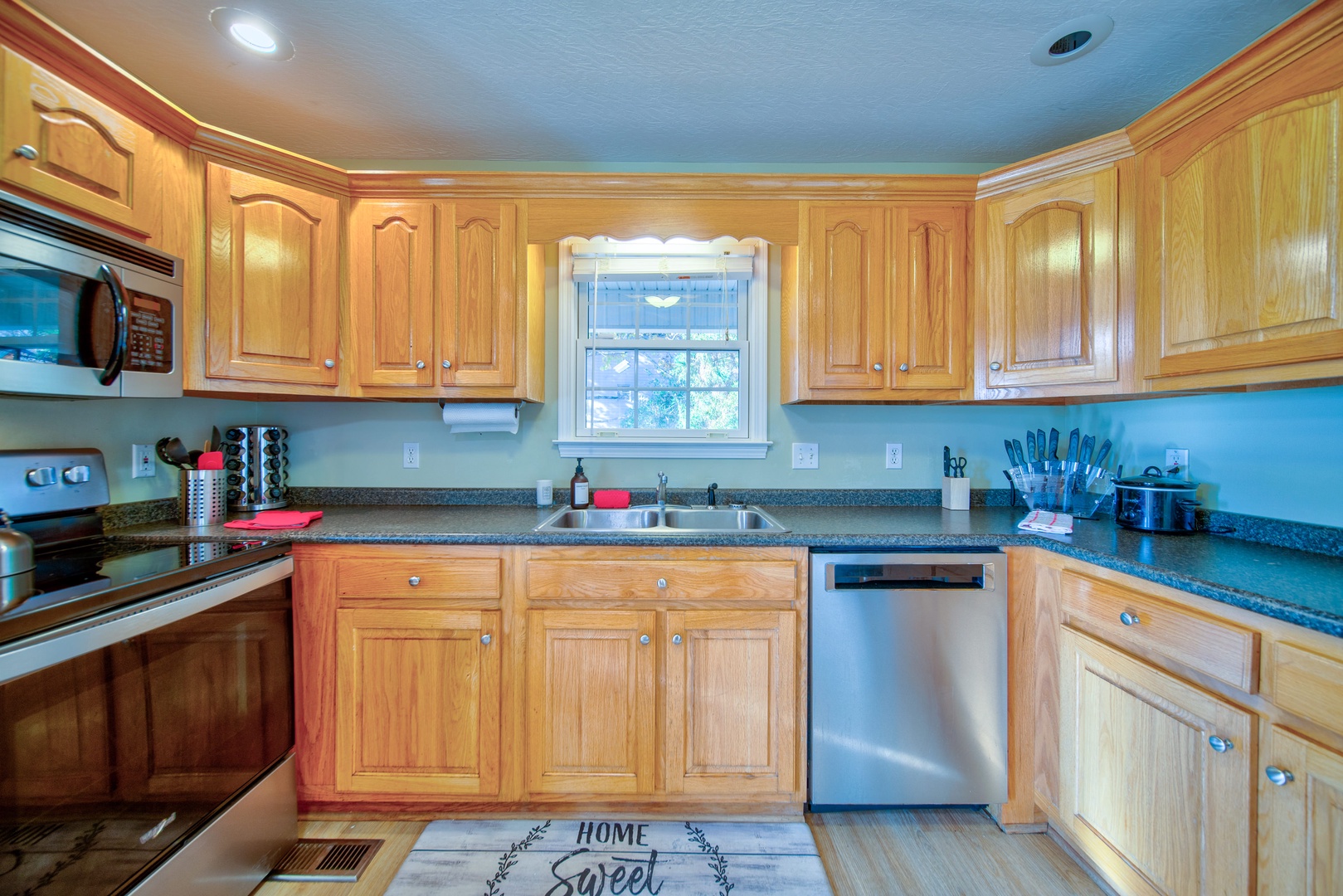 The kitchen is spacious & offers all the comforts of home