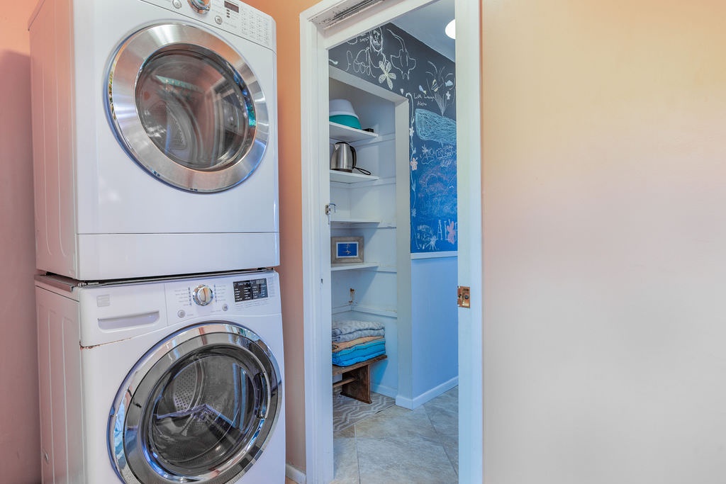 Basement laundry area with washer/dryer