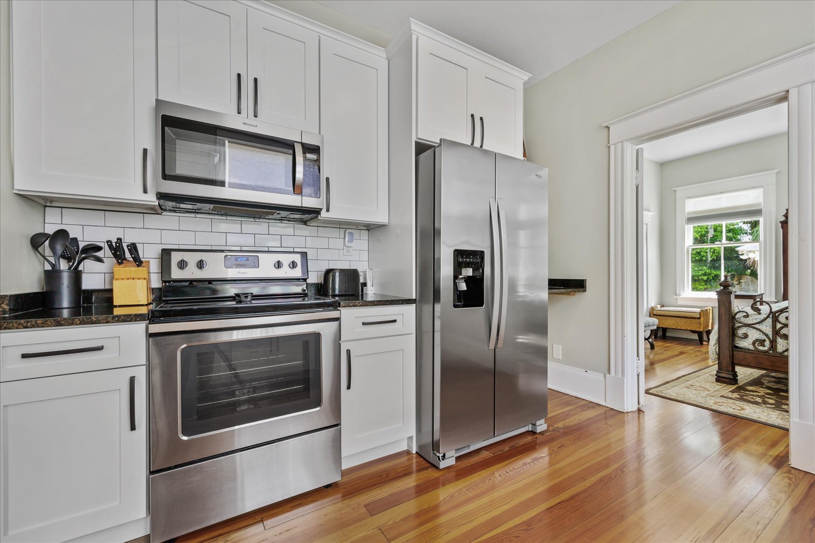 The quaint kitchen offers ample space & all the comforts of home