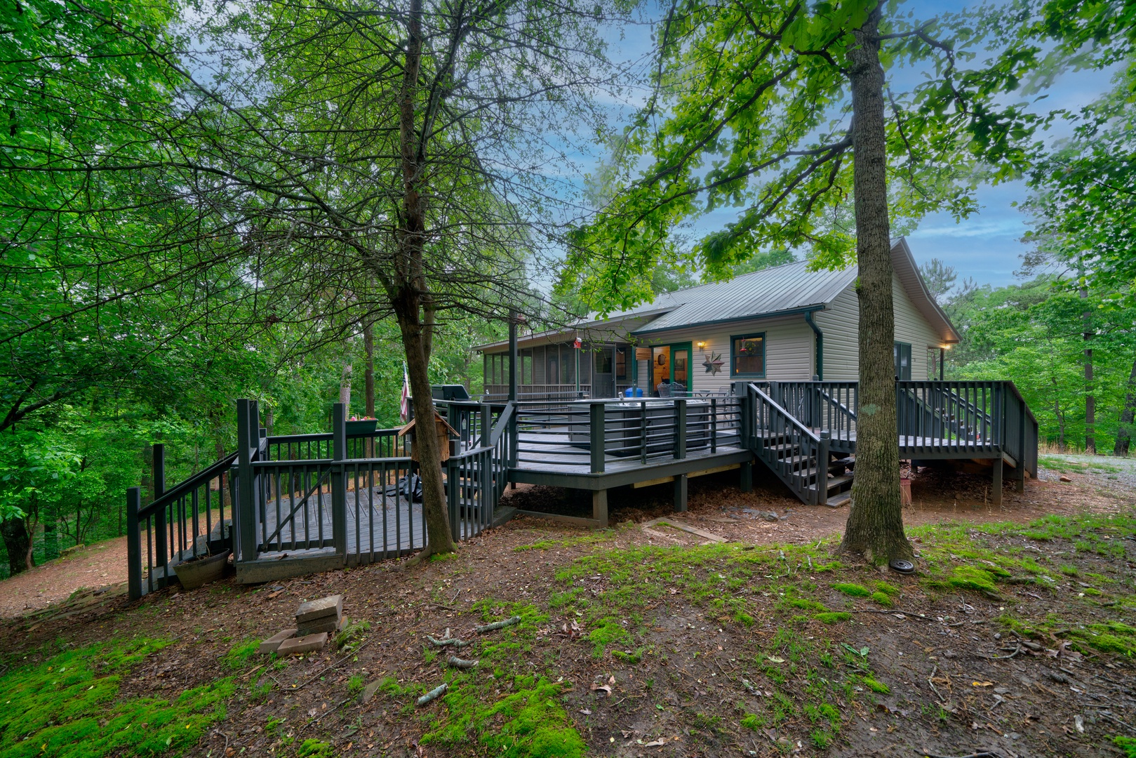 Lounge the day away on the large deck or soak in the brand-new hot tub!