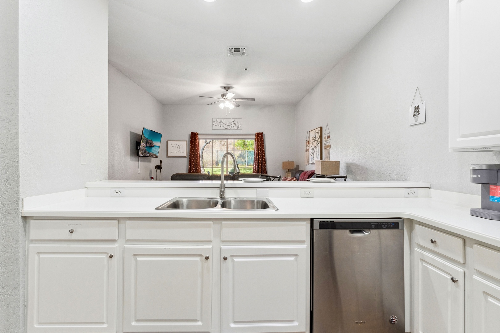 The open, airy kitchen offers ample space & all the comforts of home