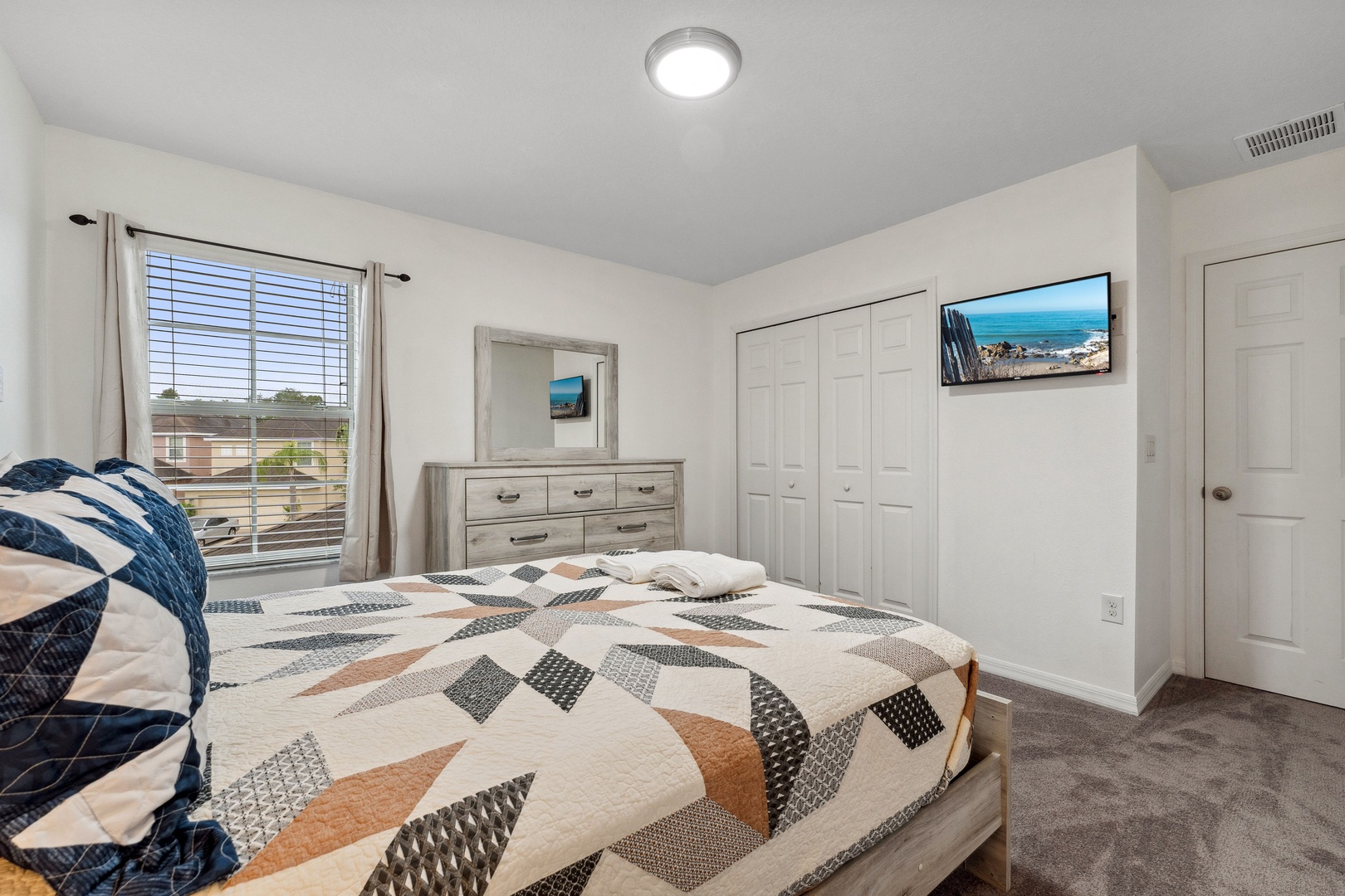 Bedroom 2 with queen bed, and Smart TV