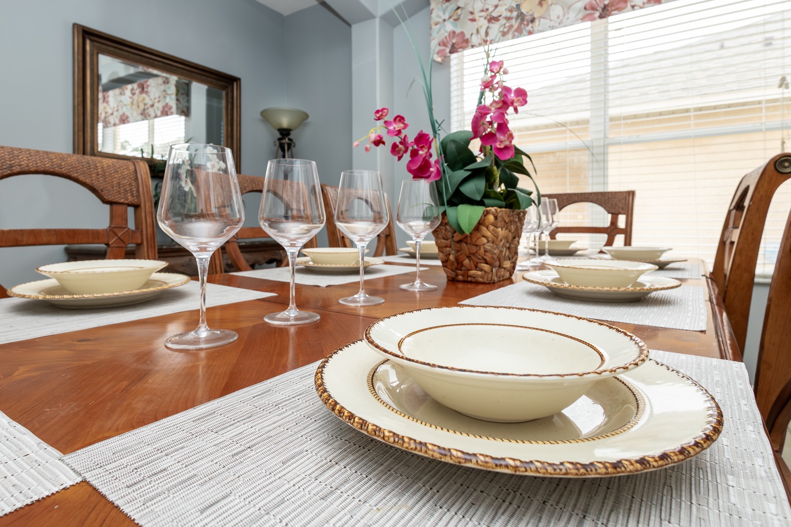 Gather for meals together at the elegant dining table, seating 8