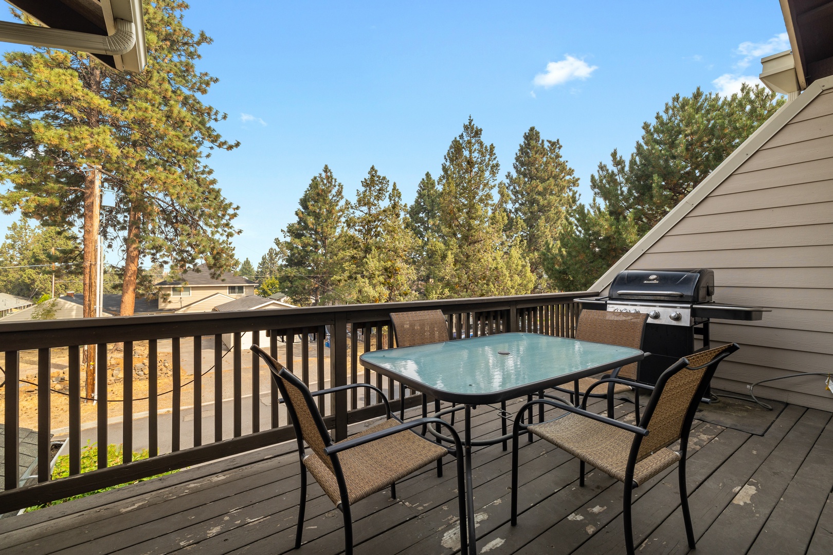 Relax on the sunny back deck while you grill up a feast!