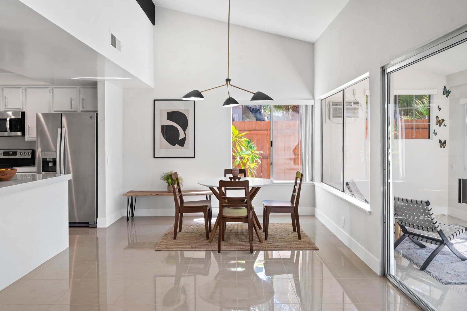 Find seating for 4 in the sleek, modern dining area