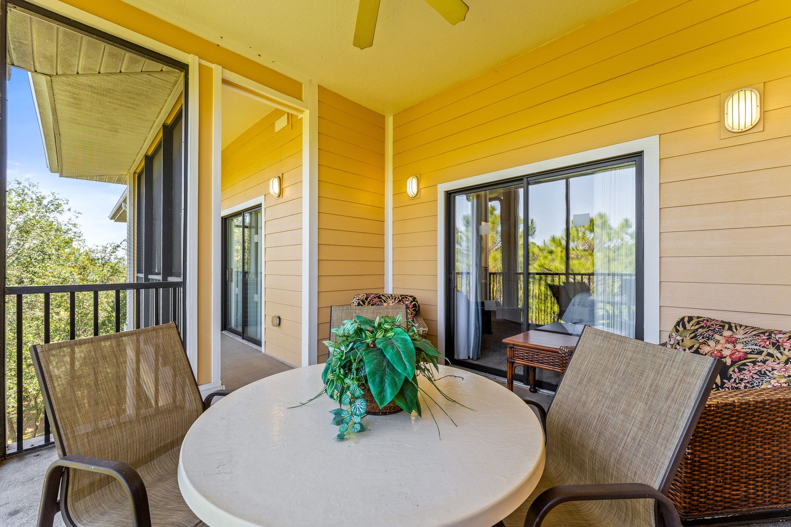 Enjoy morning coffee or dine alfresco on the breezy screened balcony