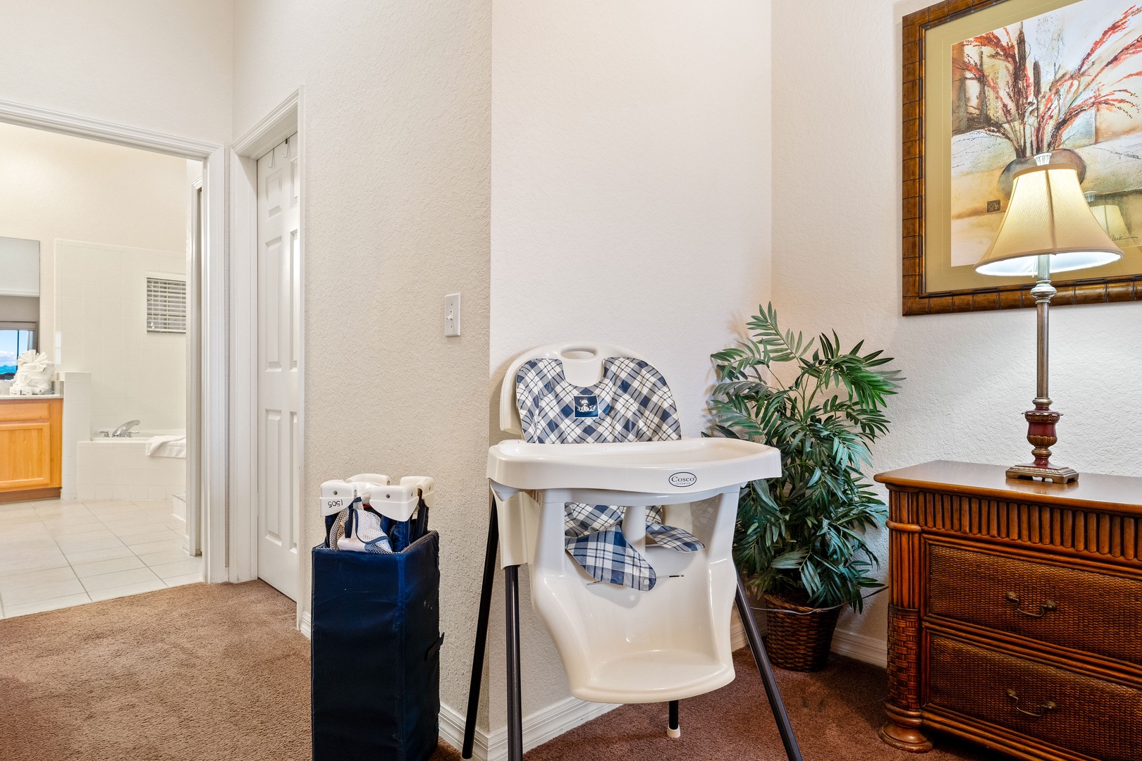 Convenient pack-and-play and highchair provided for a family-friendly stay