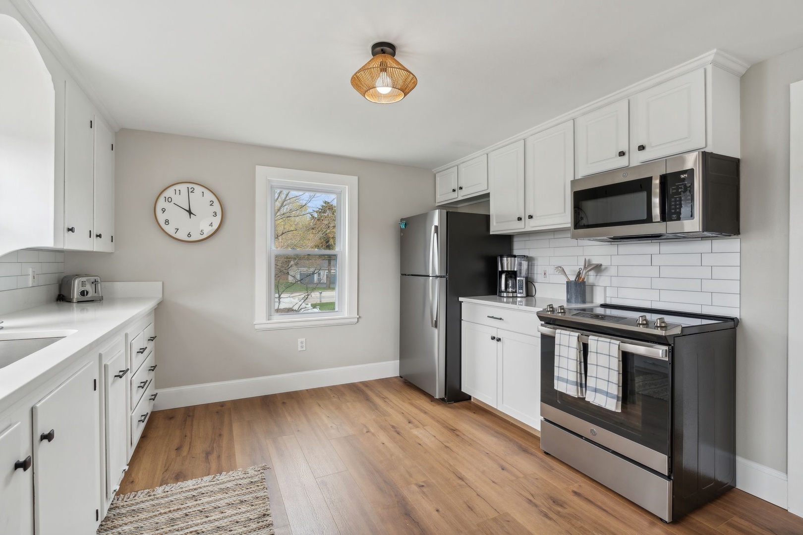 The open, airy kitchen offers ample space & all the comforts of home