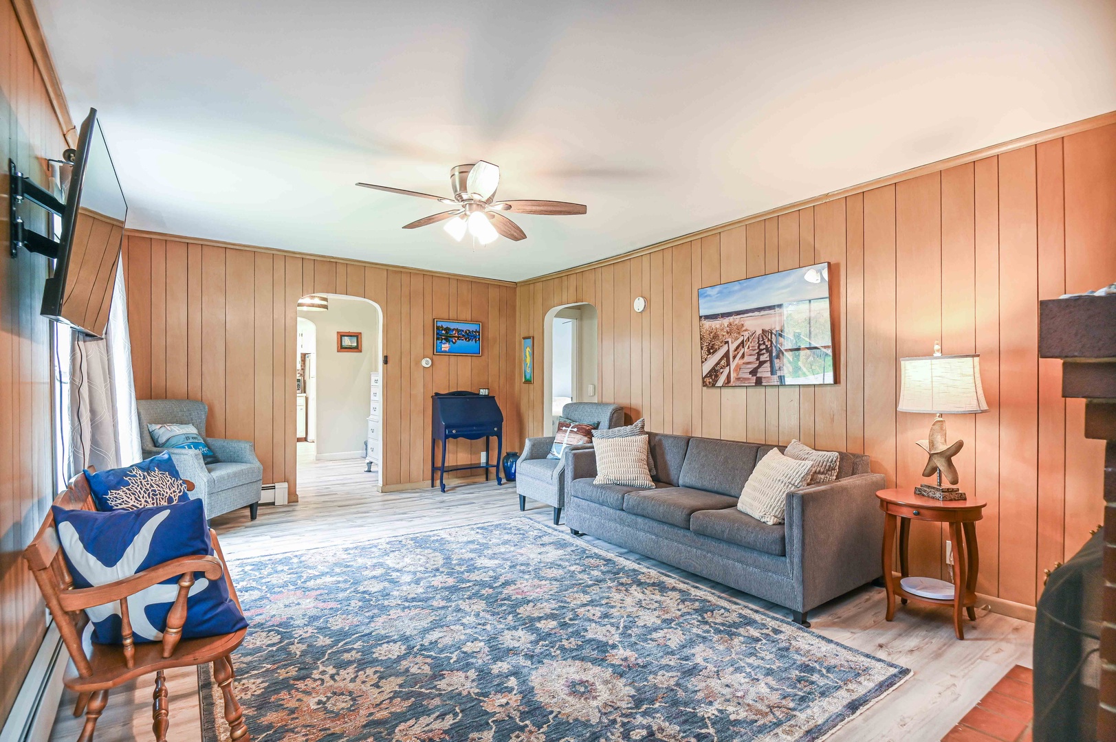 Living room with Smart TV and full size sofa sleeper