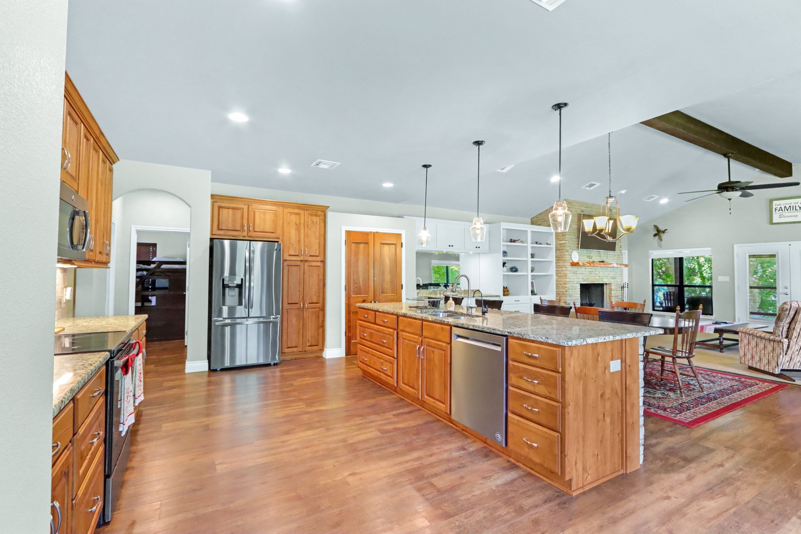 The open, updated kitchen offers ample space & all the comforts of home