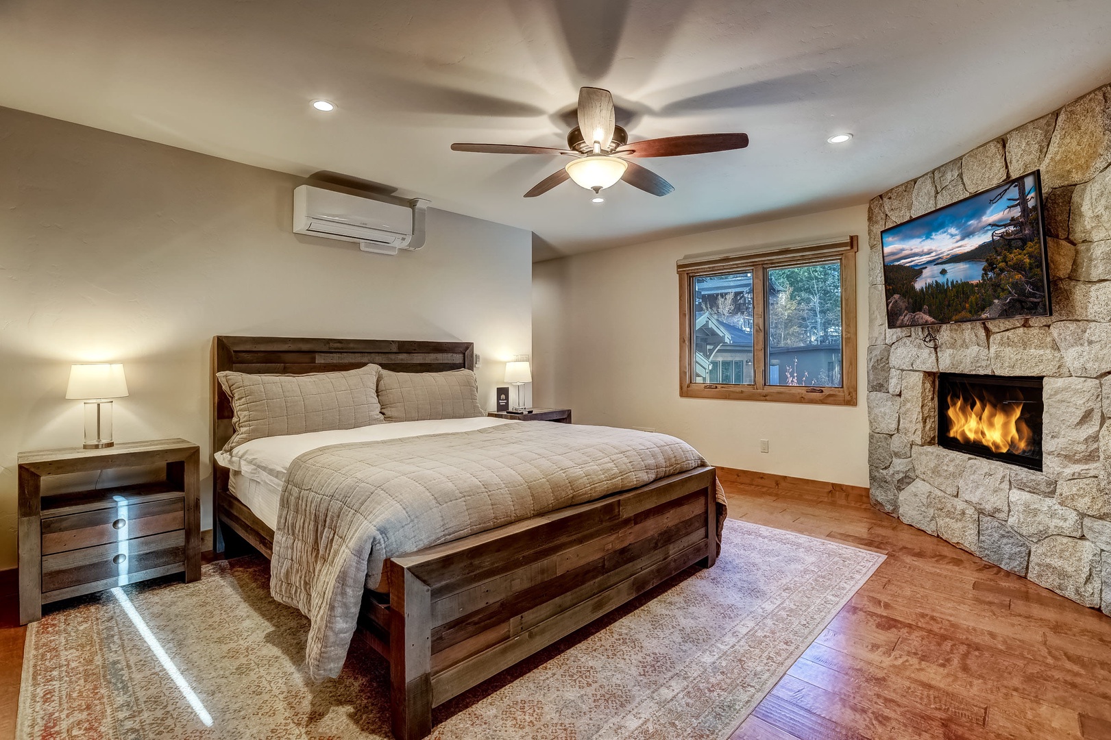 Master bedroom: King bed, TV, gas fireplace and en suite bathroom