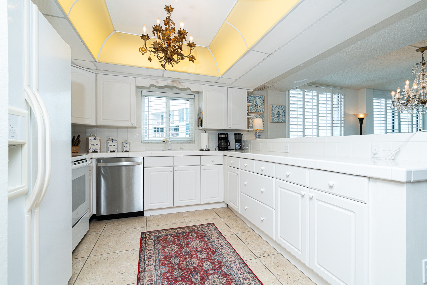 The open, airy kitchen offers ample space & all the comforts of home