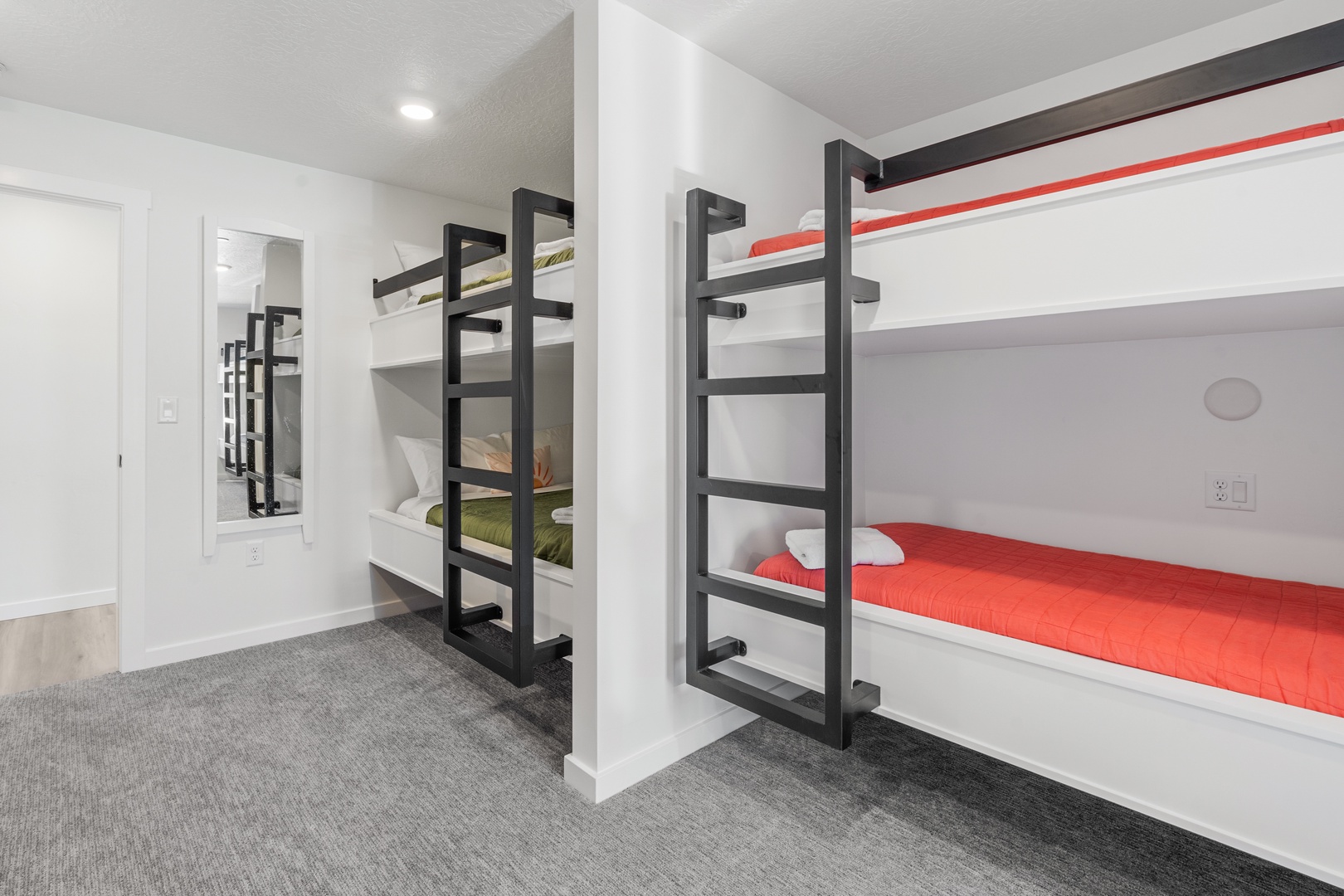 The 3rd-floor bunk suite, with full-over-full & twin bunks, ensuite, & smart TV