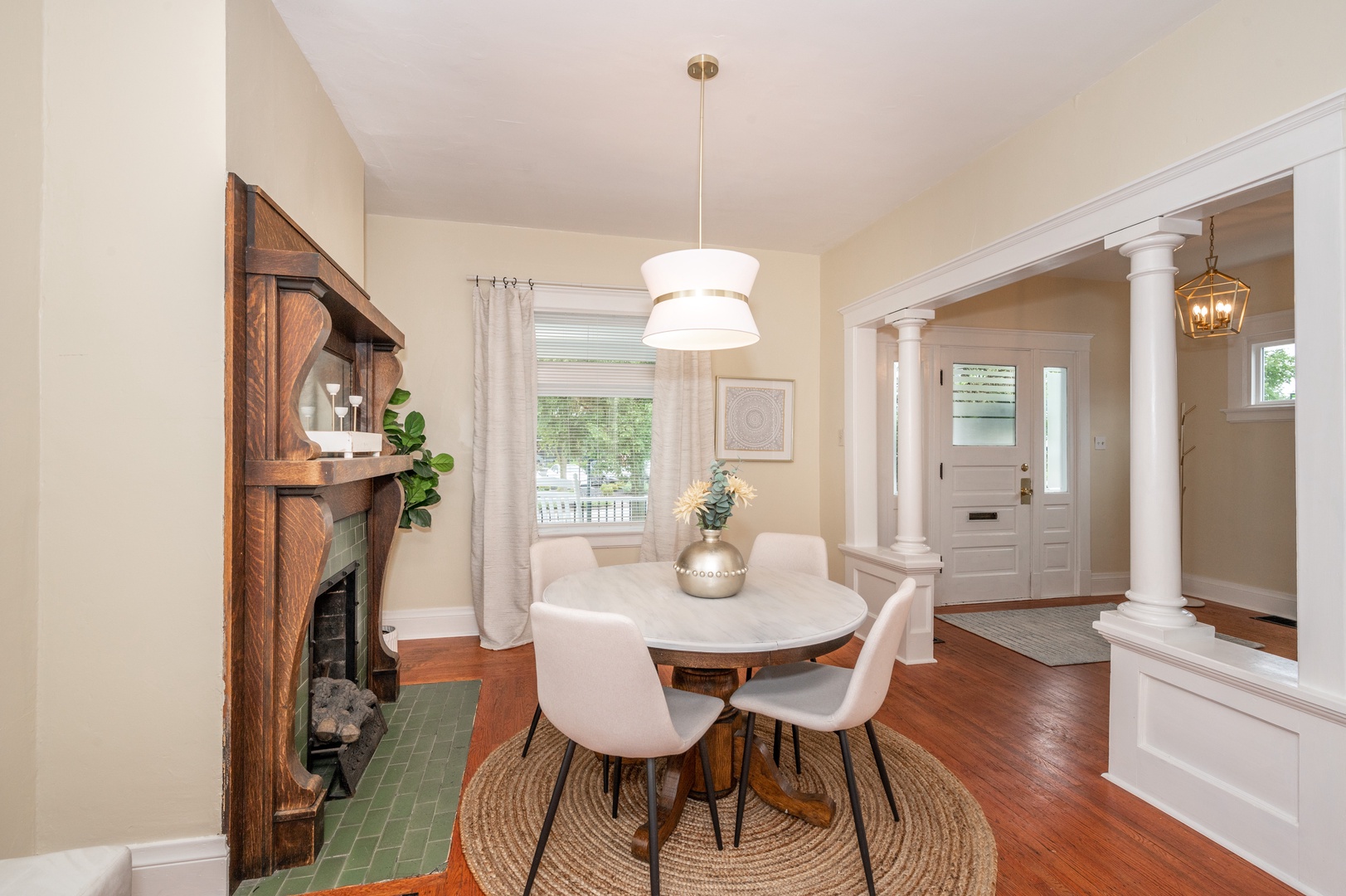 Off the entryway, find a charming dining area with table seating for 4