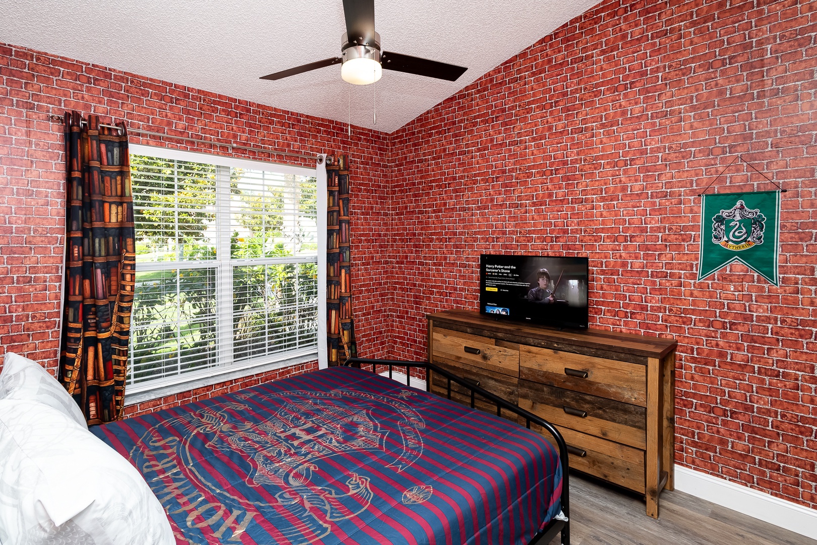 Enchanting Harry Potter bedroom with a double bed and smart TV for magical nights