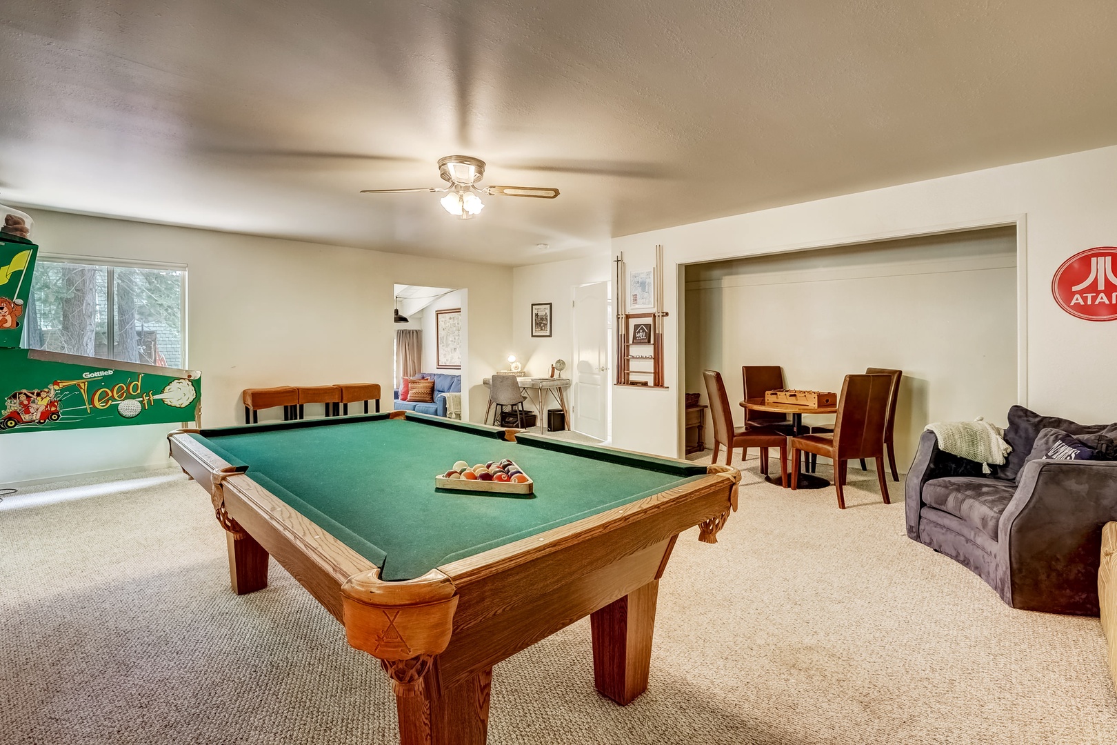 Game room with pool table & arcade game