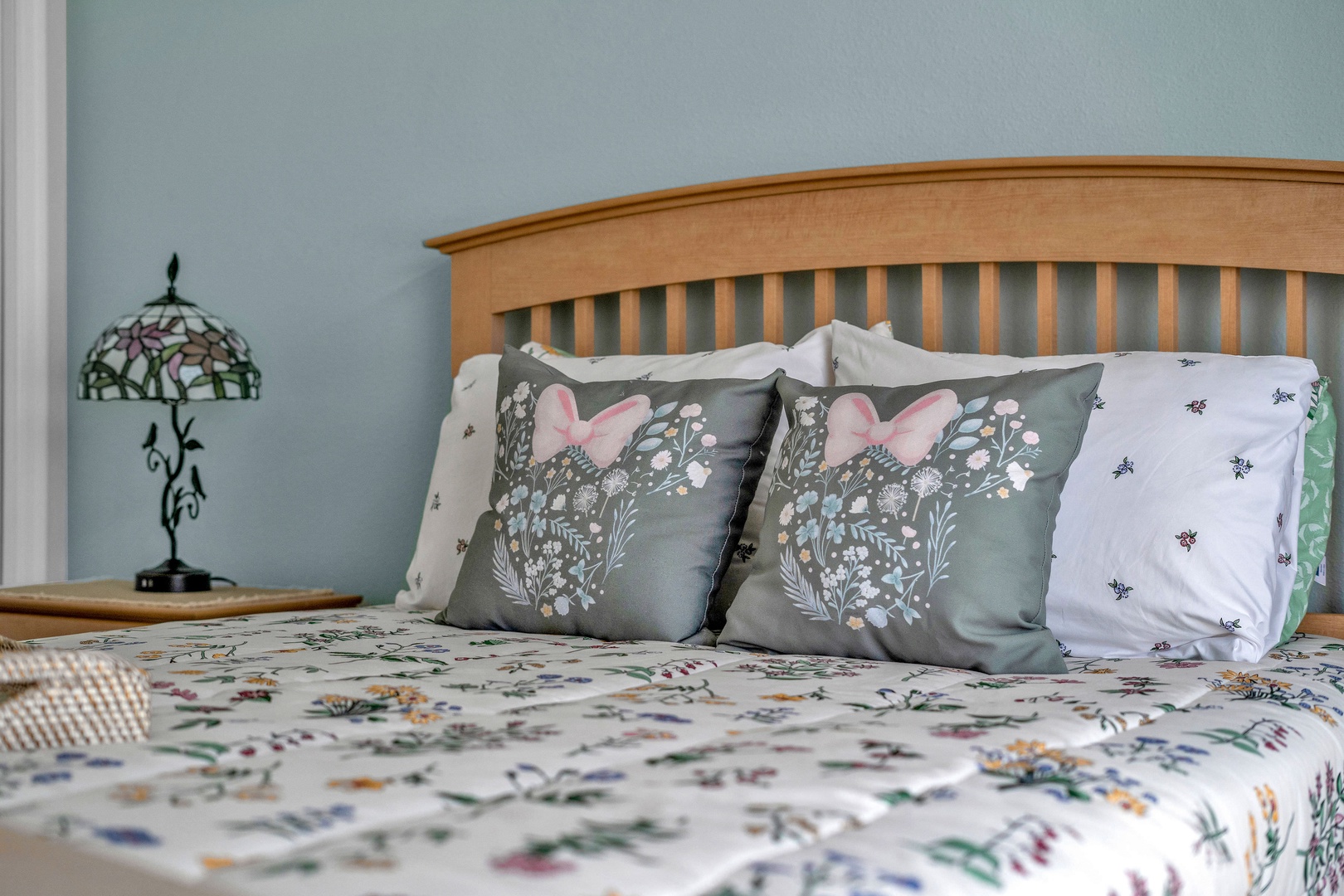 Bedroom 1 Minnie themed with queen bed, TV, and ensuite