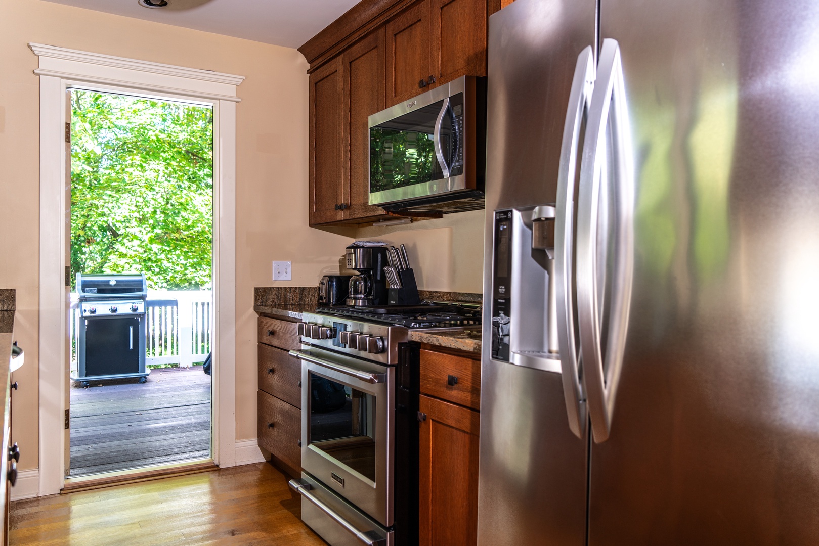 The fully equipped kitchen offers ample space & all the comforts of home