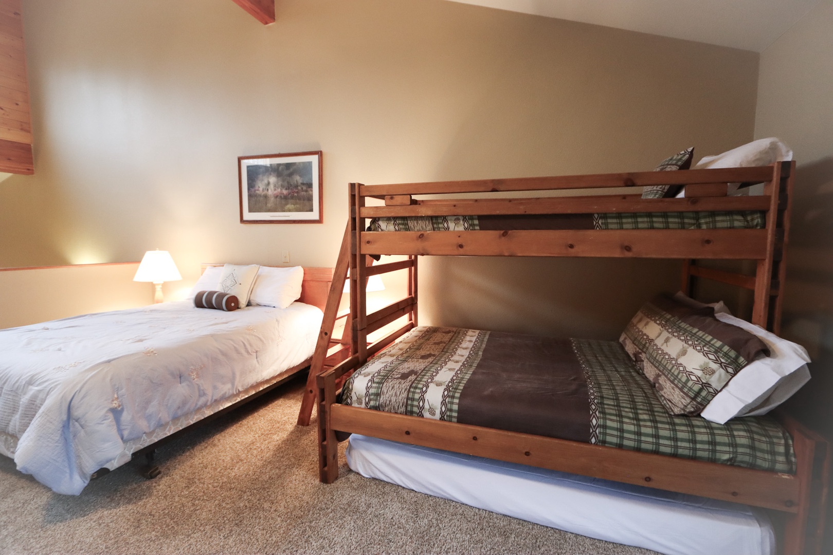 Find an additional queen bed & twin-over-full bunkbed in the spacious loft