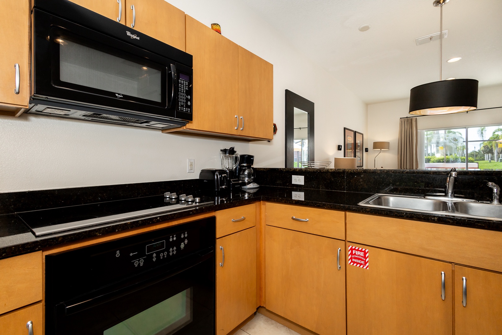 The updated kitchen is well-equipped for your visit to Kissimmee