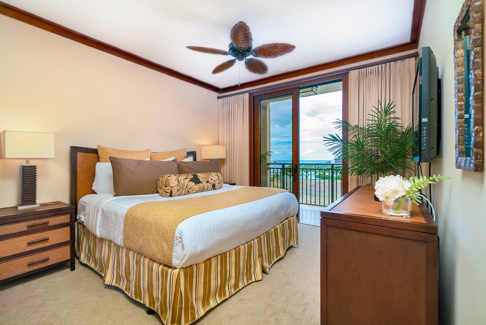 Primary Bedroom features a king bed and balcony access.