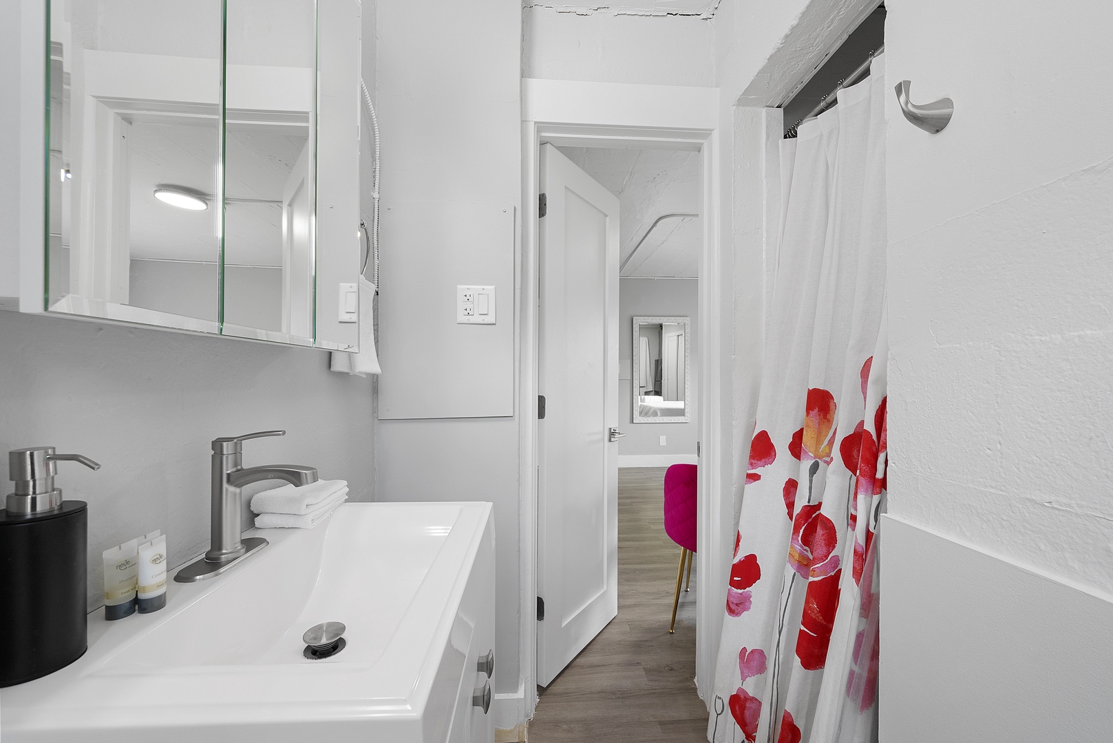 Get ready for the day in the full bath, with a single vanity & shower