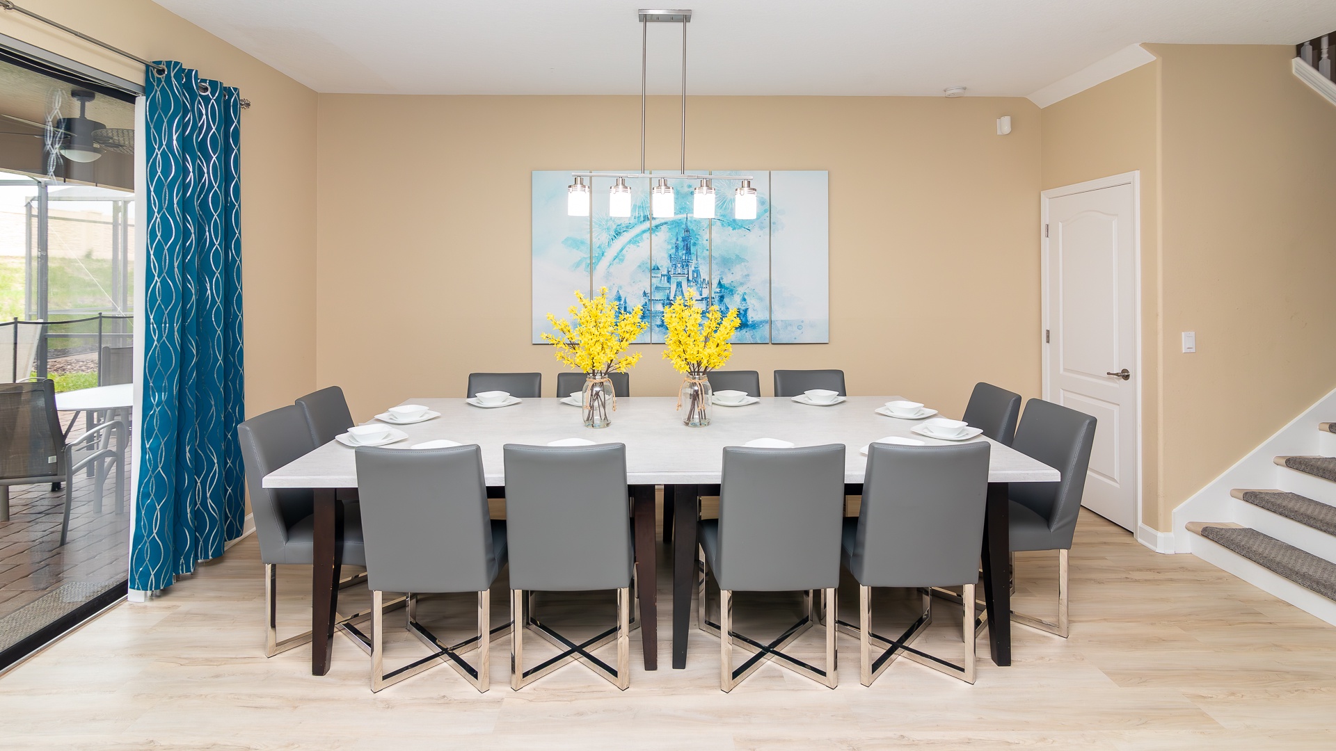 Gather for meals together at the spacious dining table, seating 12