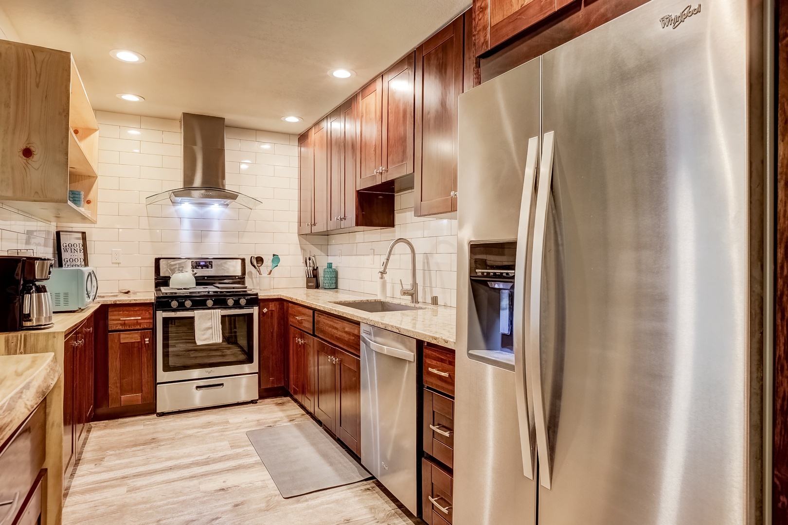 The updated, well-equipped kitchen offers ample space & amenities