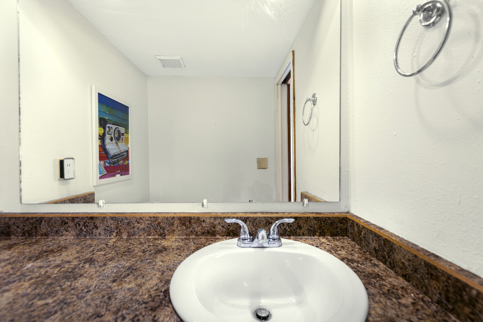 Enjoy the convenience of a half bath, available in the upper-level loft area