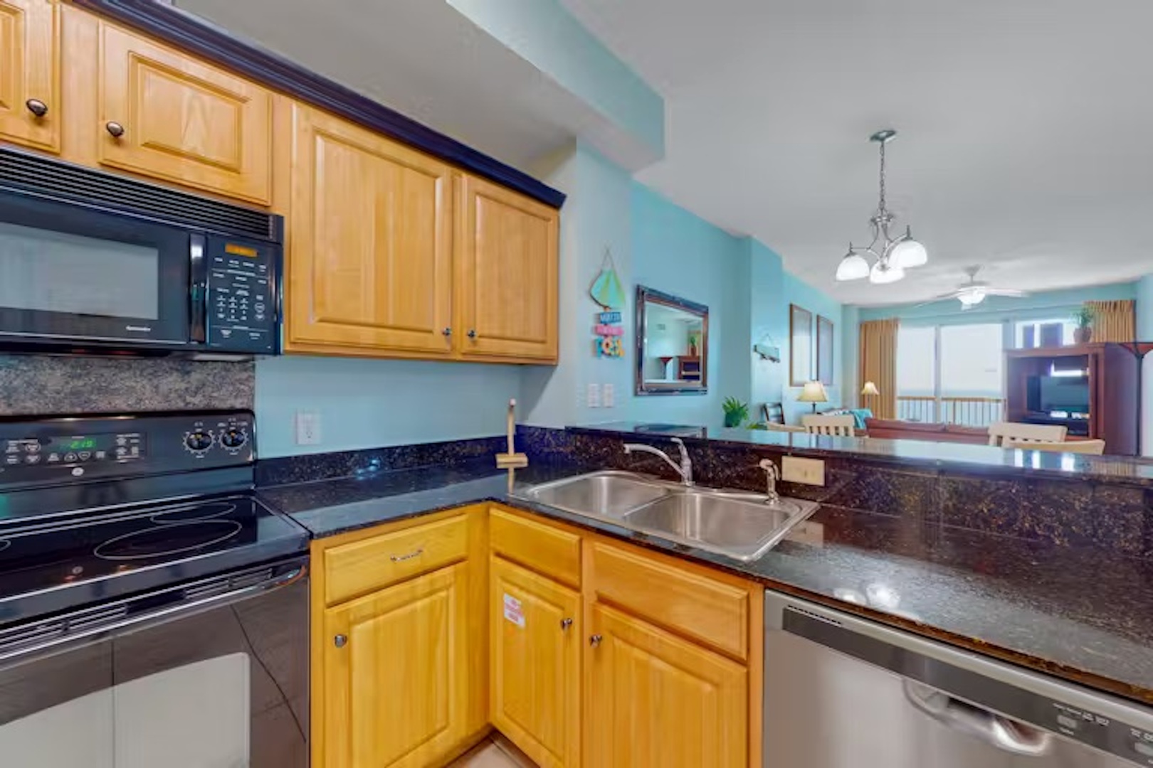 The open, airy kitchen offers ample space & all the comforts of home