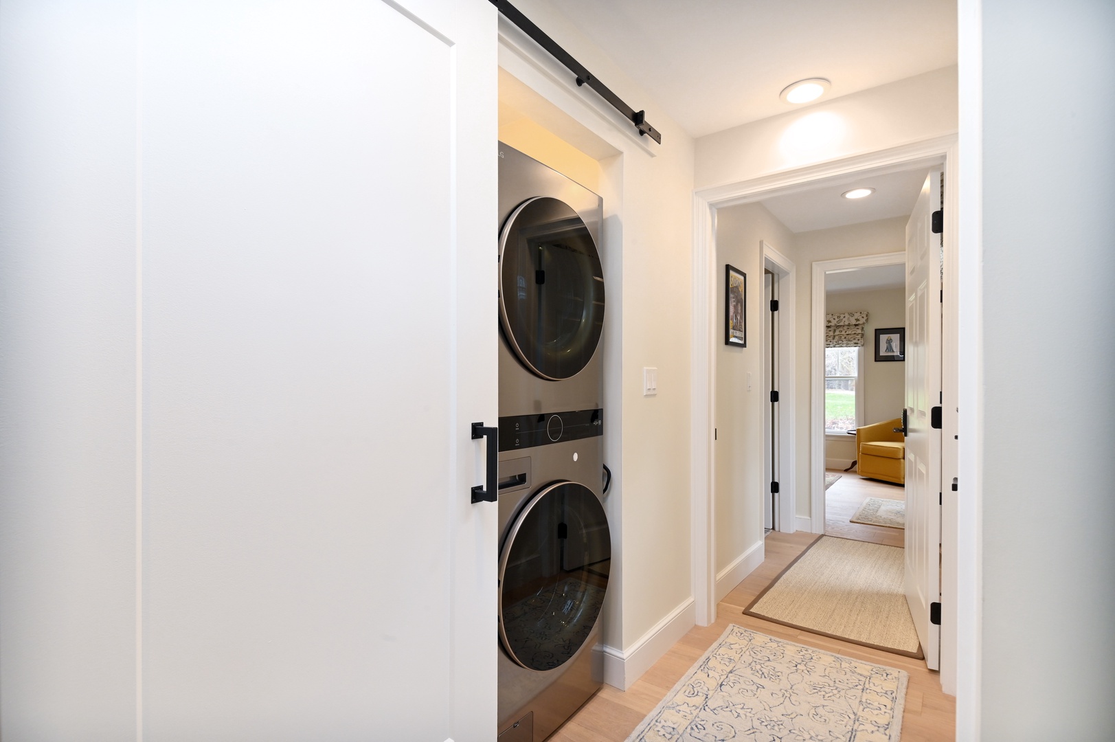 Communal laundry is available for your stay, tucked away in the entry hall