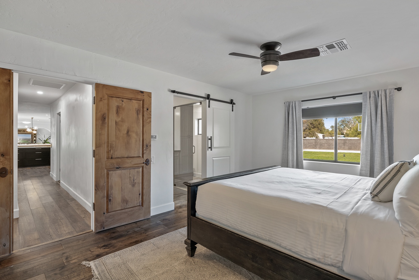 Bedroom 5 with king bed, queen sofa sleeper, Smart TV, and en-suite