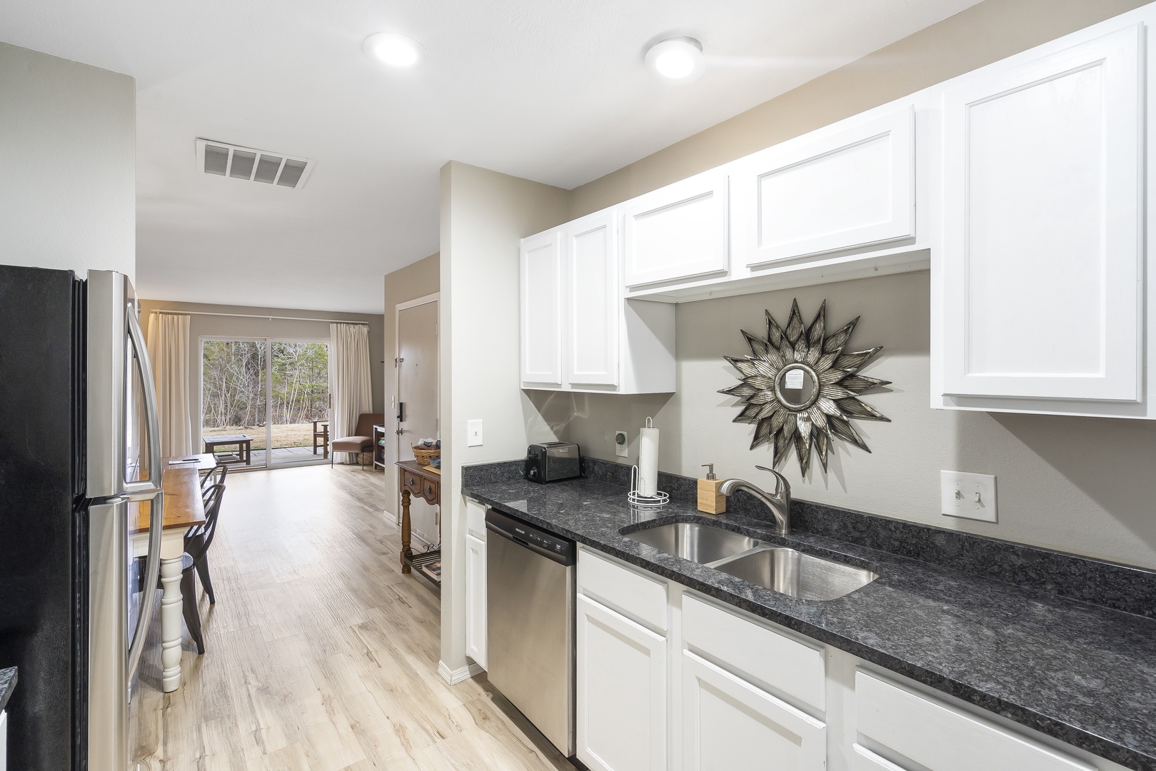 The airy kitchen offers ample space and all the comforts of home