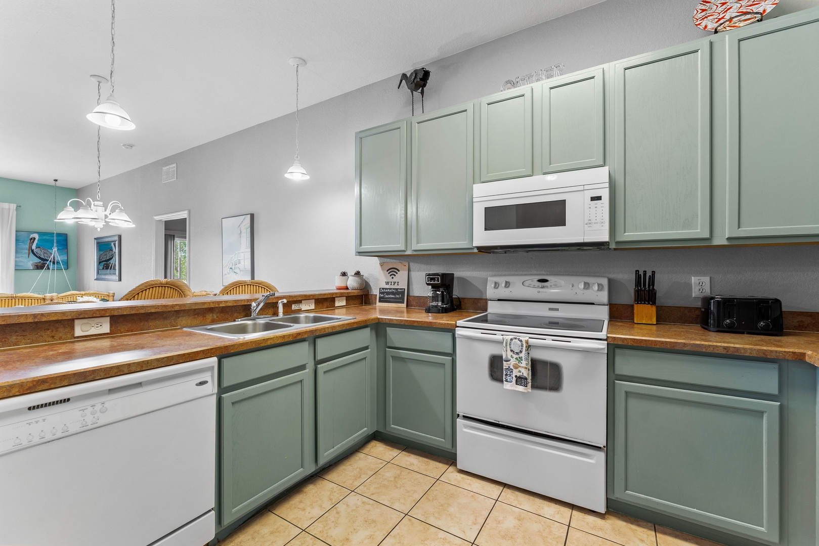 The open, airy kitchen offers ample space & all the comforts of home