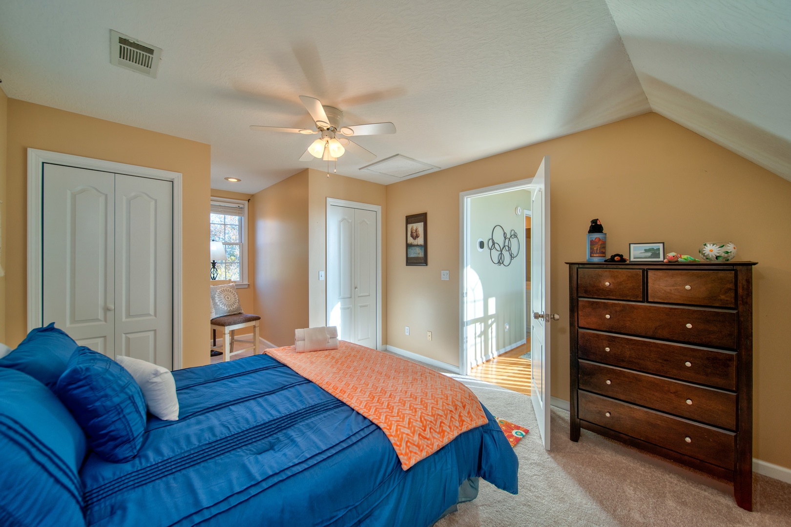 The second of two 2nd floor bedrooms, offering a comfortable queen bed