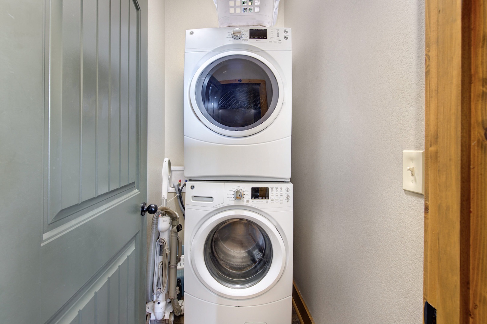 Private laundry is available for your stay, tucked away on the first level