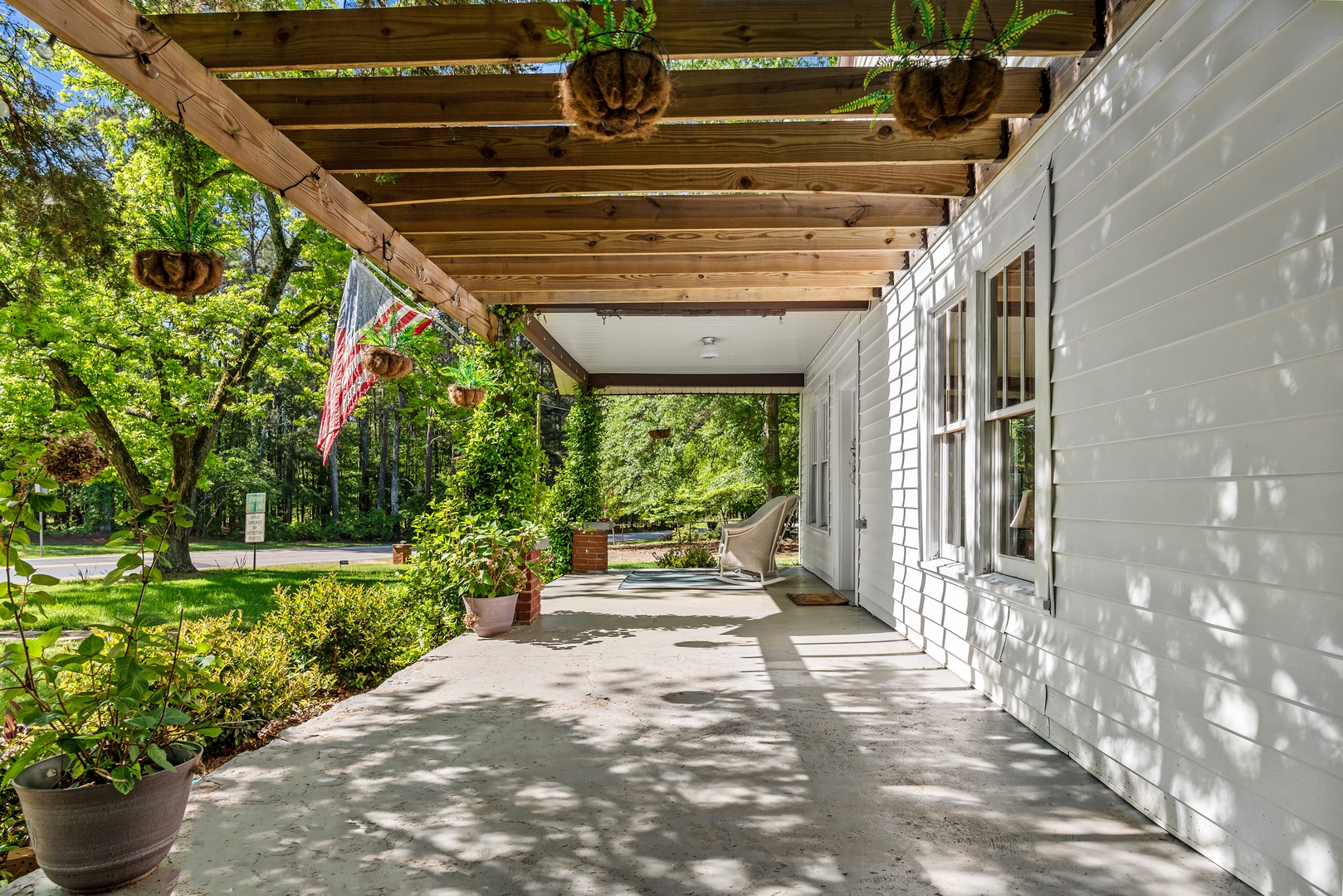 Sip morning coffee & lounge the day away on the spacious front porch