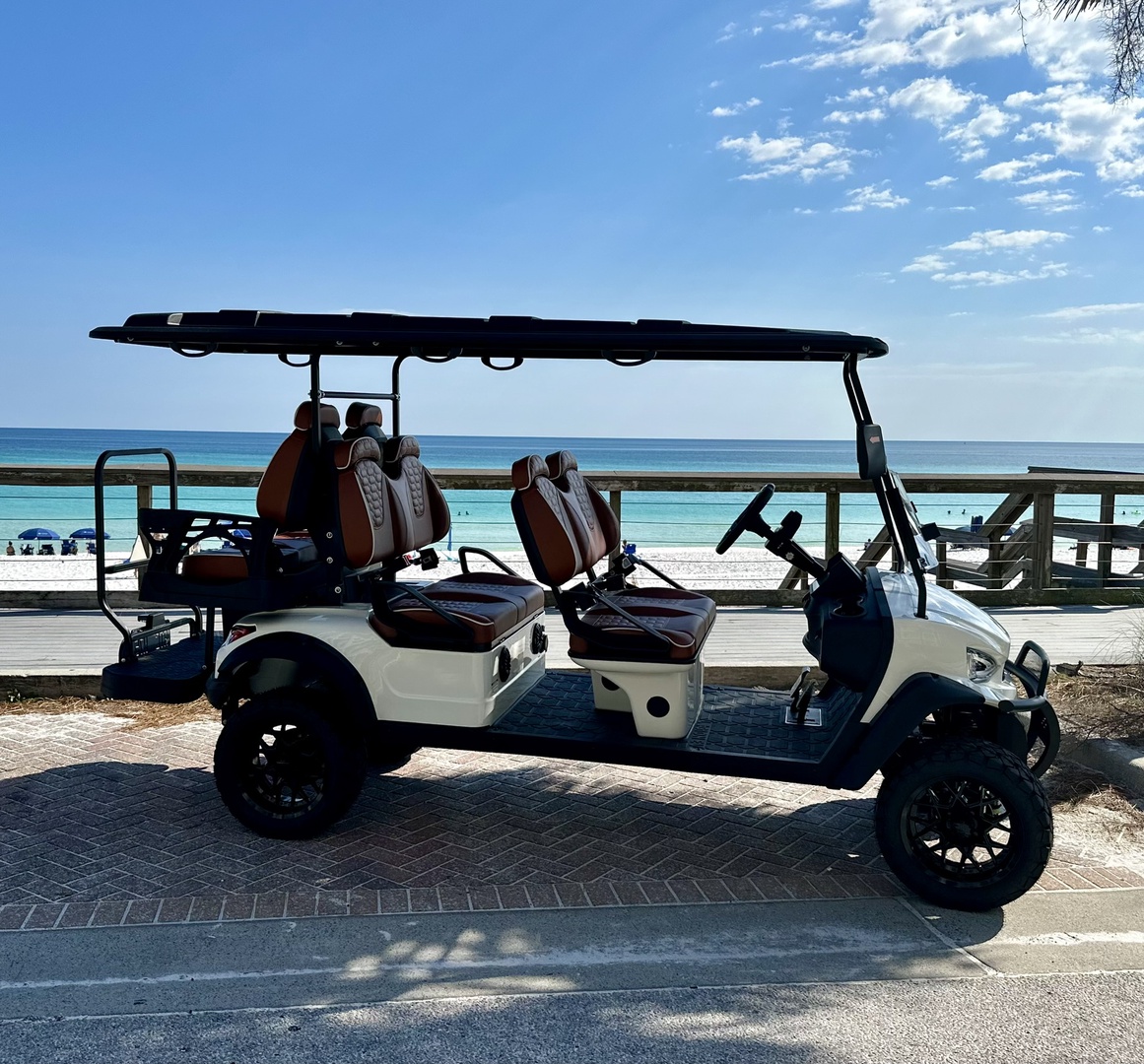 Cruise to the beach on our 6-seater golf cart!