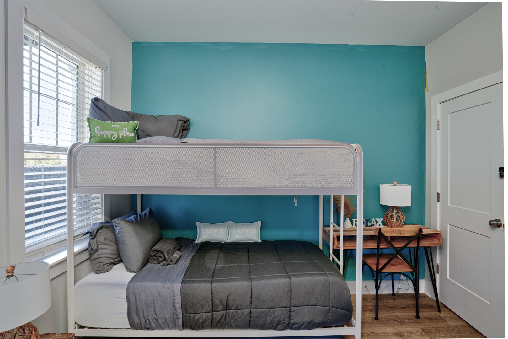 The 1st floor bunk room offers a twin-over-twin bunkbed with twin trundle