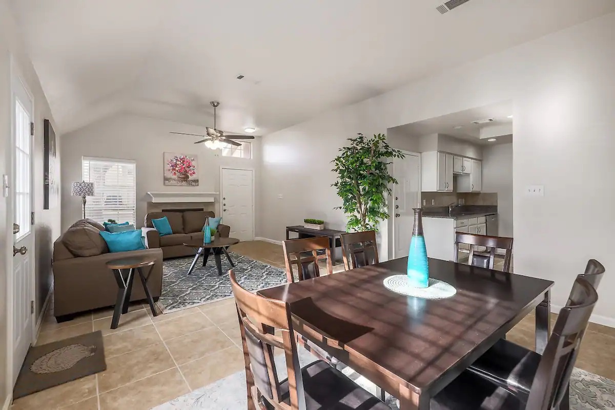 Enjoy the breezy, open layout of the living, dining, & kitchen areas