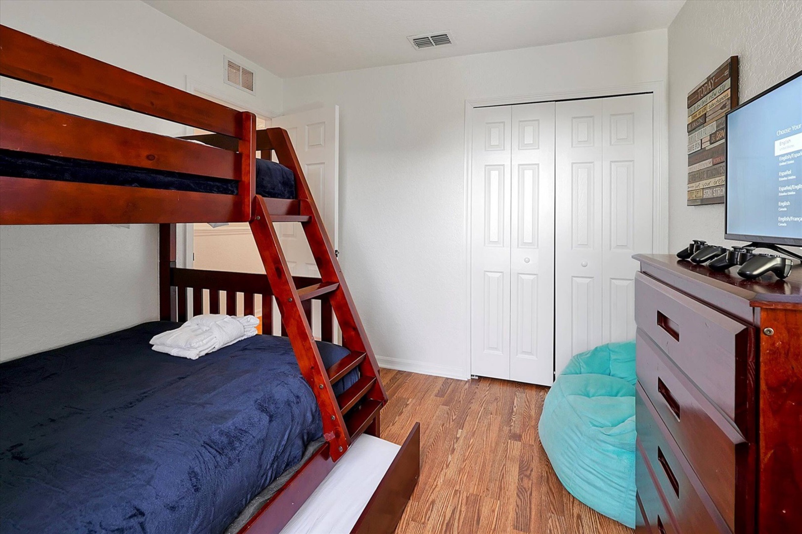 The 3rd bedroom features twin-over full bunks, a twin trundle, & smart TV