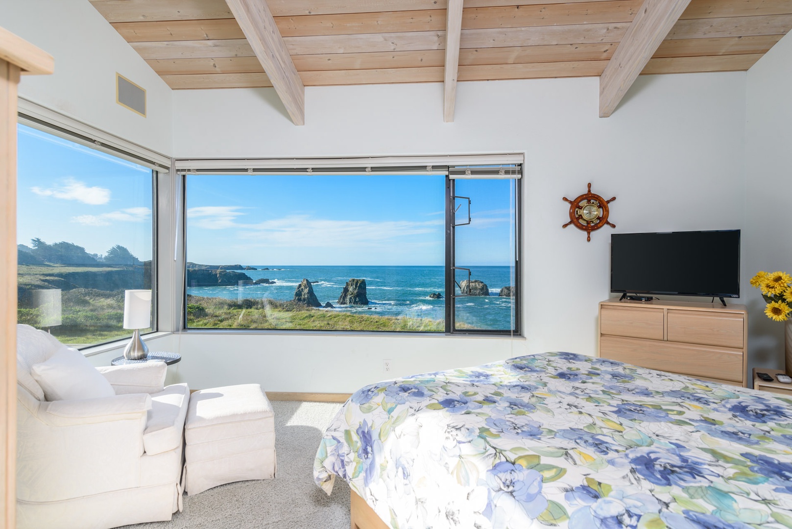 Bedroom #1 after amazing views. with a door  opening to the ocean & bluffs